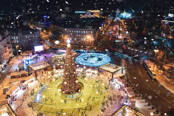 2022 Main Christmas tree of Ukraine lit up in Kyiv Ukraine. Winter evening in the city before the...