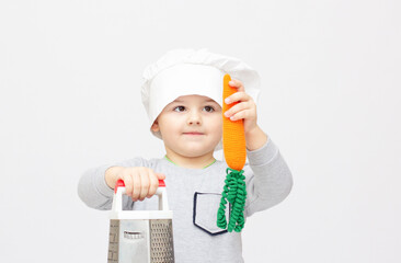 Happy little chef on white background.