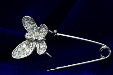 Women's brooch. Accentuate classic glamor with our edition of women's brooches. Embodying elegance,...