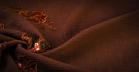 Silk brown. Fabric embellished with sequins. This unique textile has a beautiful elastic velvet...