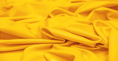 Linen fabric yellow. Linen fabric is considered luxurious because processing it from the flax plant...