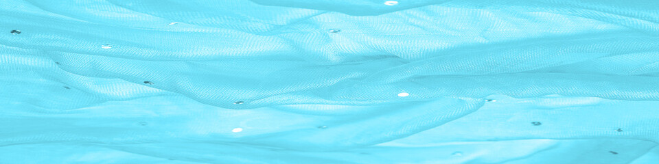 Plakat transparent blue fabric with color glitter, known for its library of classic and modern design. texture, background