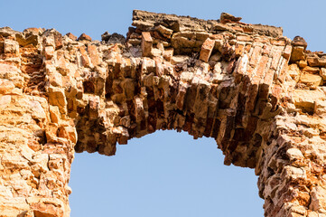 arch made of old, crumbling bricks