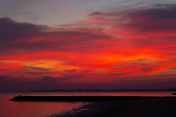 Sunset beach silhouette free styles in holiday ,water  sky and people.