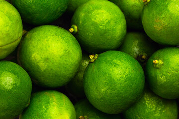 fresh green lemon in supermarket