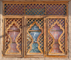 Uzbekistan, the city of Khiva, wooden window in oriental  style