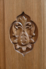Ornament on a wooden door brown wood texture beautiful pattern flower carving elegance