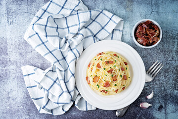 Bacon garlic parsley pasta in a plate