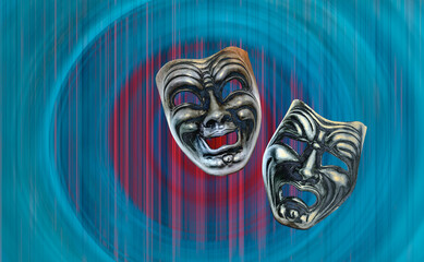 Comedy and Tragedy theatrical venetian mask isolated blue background