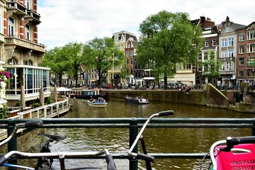 Fototapeta na wymiar Amsterdam canal view from bridge