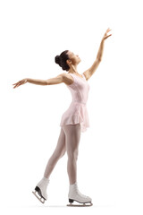 Full length profile shot of a young female performing figure skating