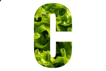 Letter C of the English alphabet made from fresh green lettuce leaves on a white isolated background. Bright alphabet for design