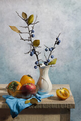 Wonderful still life with persimmons, vase and berries. Good illustration for book, journal or postcard. © Сергей Когда