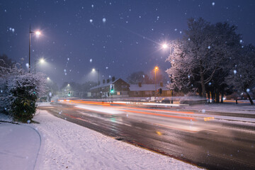 Snowy evening on streets in England, UK
