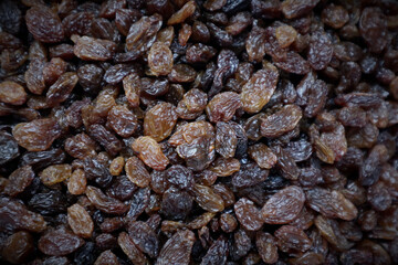 Baking ingredients and dried fruit raisins, dried grapes stock photo