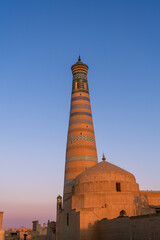 Uzbekistan, city of Khiva,  at sunset,  the Islam Khoja Minaret is situated in the historical center. 