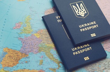 Passports are on the world map. Travel concept.