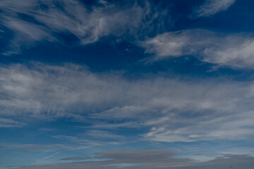 Obraz premium Blue sky with white clouds in a sunny day..