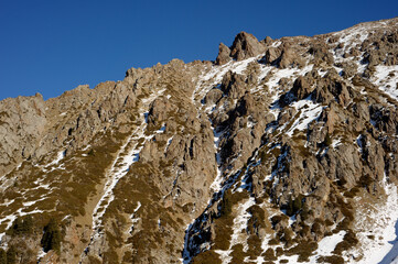 Majestic mountain peaks covered with snow (altitude: over 3200 meters). Ile Alatau, also spelt as...
