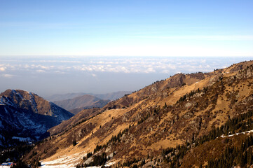 Majestic mountain peaks covered with snow (altitude: over 3200 meters). Ile Alatau, also spelt as...