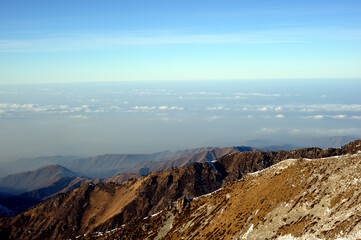 Obraz premium Majestic mountain peaks covered with snow (altitude: over 3200 meters). Ile Alatau, also spelt as Trans-Ili Alatau, etc., is a part of the Northern Tian Shan mountain system in Kazakhstan