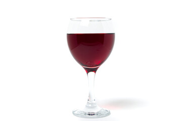 Glass of red wine on a white background. Alcoholic drink.