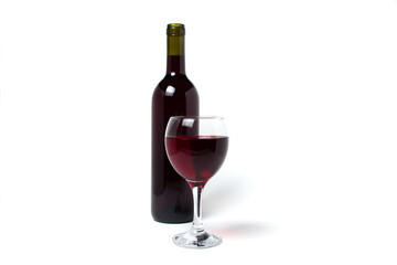 A glass of red wine and a bottle of wine on a white background. Alcoholic drink.