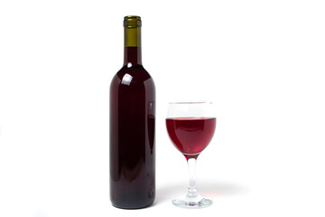 A glass of red wine and a bottle of wine on a white background. Alcoholic drink.