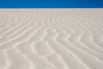 Fototapeta na wymiar Low Angle of Powder Like Sand Sparking In The Sun
