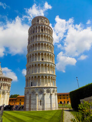 The Leaning Tower of Pisa, Tower of Pisa, Piazza del Duomo with a Blue Sky and Puffy Clouds