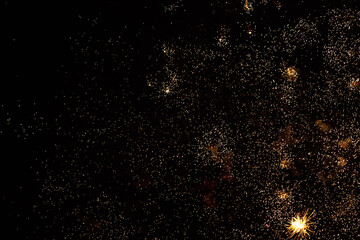 Fireworks sparks on a black sky background. graphic resource for design. Blank for the designer....