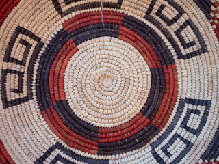 Obraz premium Close Up of Woven Basket with Geometric Patterns