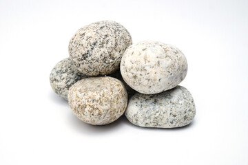 Fototapeta na wymiar Pebbles are mottled, sea pebbles. Stones isolated on a white background.