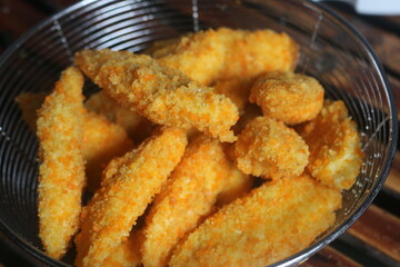 Freshly ripe fried bananas with a brown color made with bananas dipped in a mixture of liquid flour and breadcrumbs