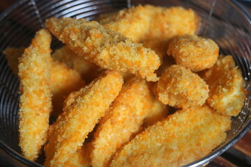 Freshly ripe fried bananas with a brown color made with bananas dipped in a mixture of liquid flour and breadcrumbs