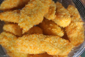 Freshly ripe fried bananas with a brown color made with bananas dipped in a mixture of liquid flour and breadcrumbs