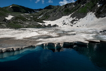 transparent blue mountain lake in Arkhyz