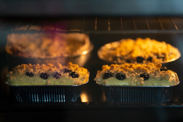 Freshly chiffon cake on baking trays in the oven. homemade bake,Selective focus