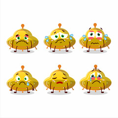 UFO yellow gummy candy cartoon character with sad expression