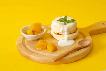 Menu pancake mango on yellow background