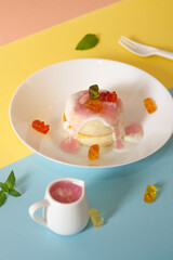 Menu pancake jelly and lychee on color background