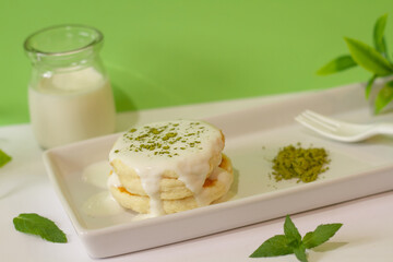 Menu pancake green tea on green background