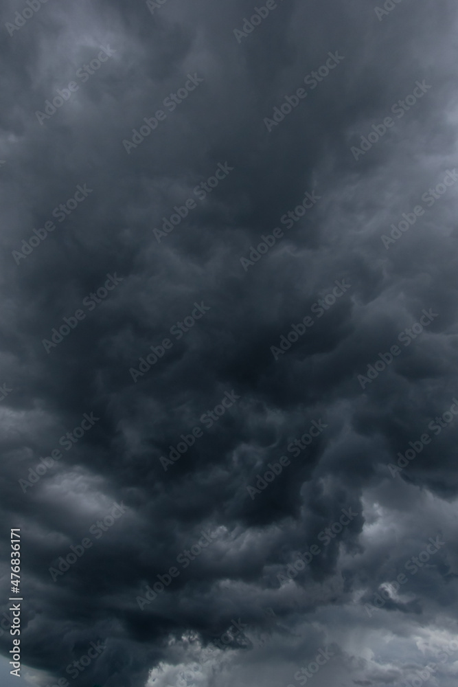 Aufkleber The dark sky with heavy clouds converging and a violent storm before the rain.Bad or moody weather sky and environment. carbon dioxide emissions, greenhouse effect, global warming, climate change.