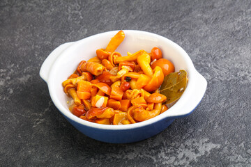 Marinated pickled honey mushrooms in the bowl