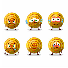 Yellow spiral gummy candy cartoon character with sad expression