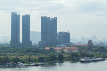 One of view of Ho Chi Minh city, urban with many office building, state bank, luxury hotel by Saigon river