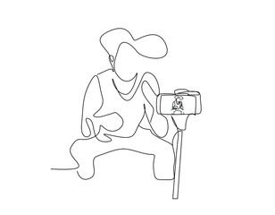 a teenager records himself in front of a video camera and broadcasts live