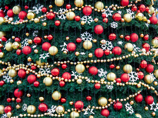 many Christmas toys on the Christmas tree as texture and background.