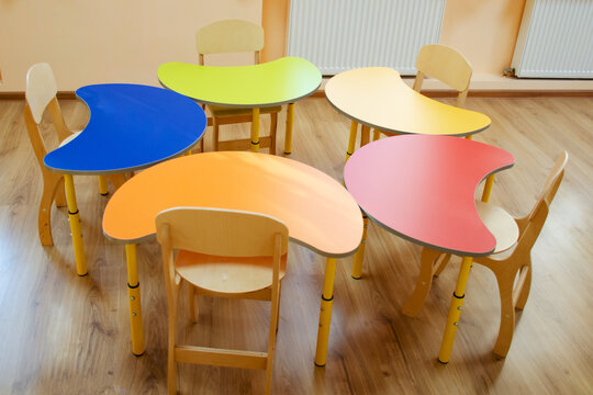 Colored children's tables preschoolers. Fashionable interior for children