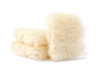 Bricks of dried rice noodles isolated on white. East Asian cuisine